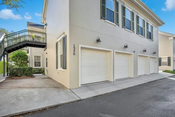 an aerial view of a house with a garden