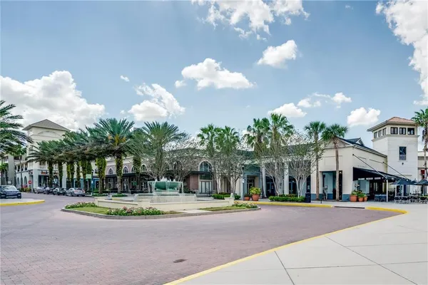 a view of a building with a fountain