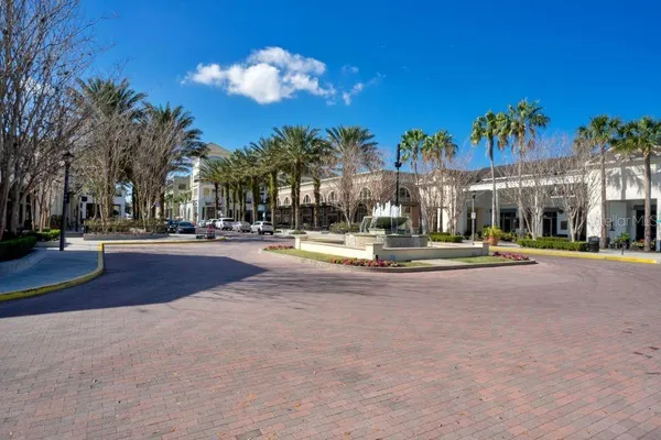 a view of a building with sitting area