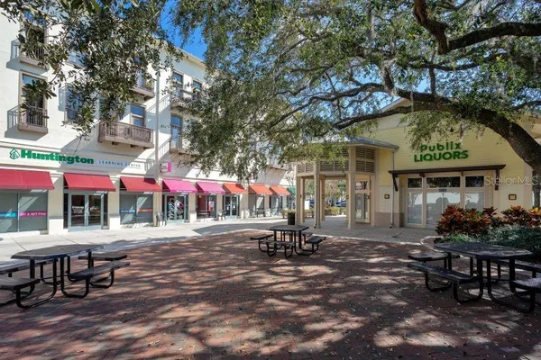 a view of a lake with a table and a chair