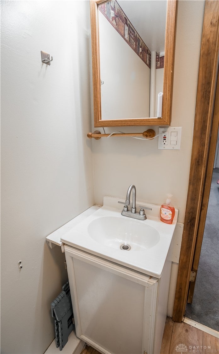 220 Racer Street Troy, OH 45373 - Photo 24 of 33 This second floor bathroom features a sleek vanity, offering everyday convenience.