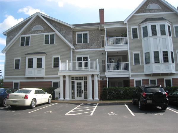 200 Chickering Road, Unit 306B North Andover, MA 01845 - Photo 1 of 30 a view of a car parked in front of a building