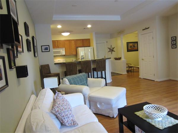 200 Chickering Road, Unit 306B North Andover, MA 01845 - Photo 11 of 30 a living room with furniture and a view of kitchen