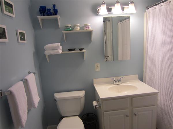 200 Chickering Road, Unit 306B North Andover, MA 01845 - Photo 13 of 30 a bathroom with a sink mirror and toilet