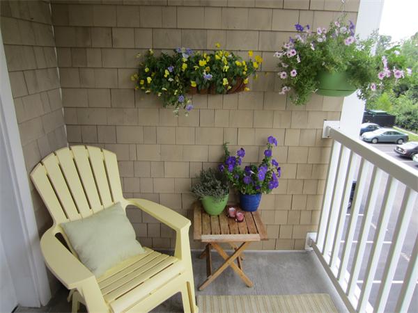 200 Chickering Road, Unit 306B North Andover, MA 01845 - Photo 17 of 30 a view of a chairs and table in a patio