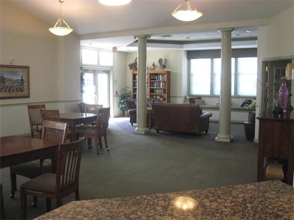 200 Chickering Road, Unit 306B North Andover, MA 01845 - Photo 27 of 30 a living room with furniture and a table