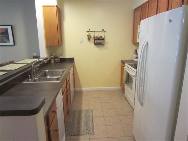 200 Chickering Road, Unit 306B North Andover, MA 01845 - Photo 8 of 30 a bathroom with a sink and a washing machine