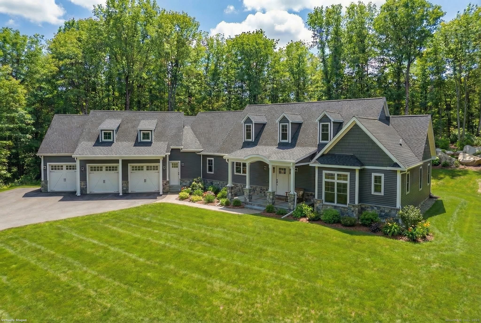 front view of a house with a yard