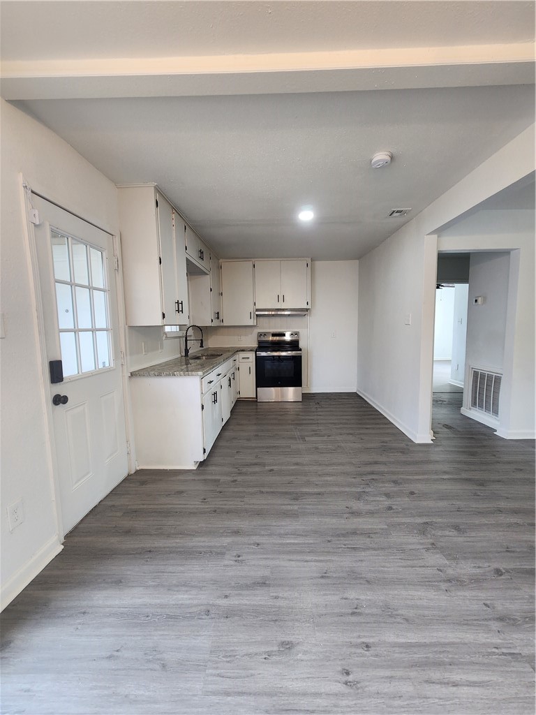 4818 Lansdown Drive Corpus Christi, TX 78411 - Photo 2 of 9 a view of kitchen with wooden floor and electronic appliances