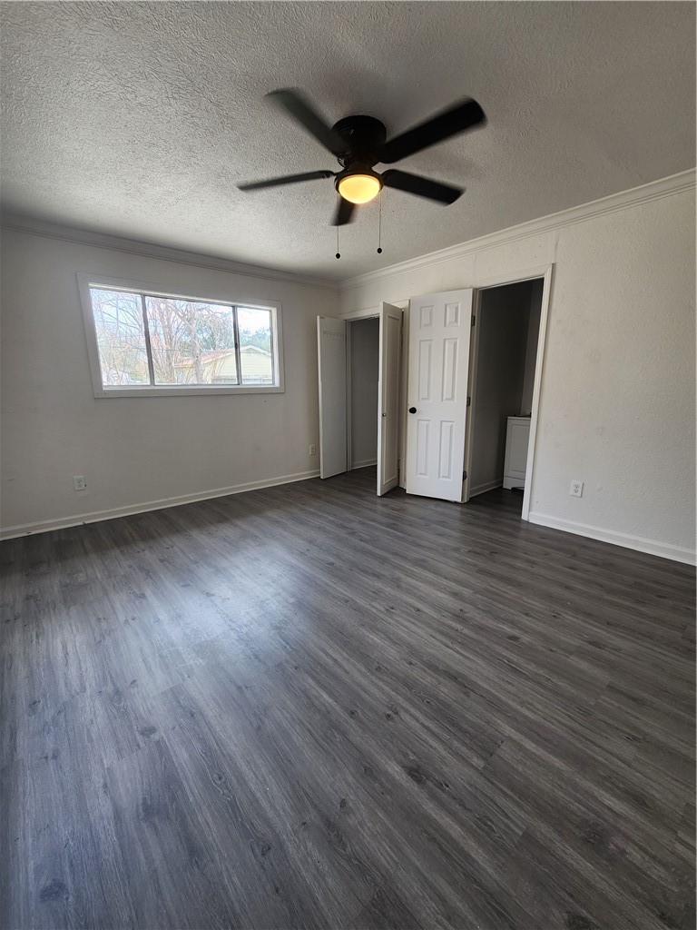 4818 Lansdown Drive Corpus Christi, TX 78411 - Photo 4 of 9 a view of an empty room with wooden floor and a window