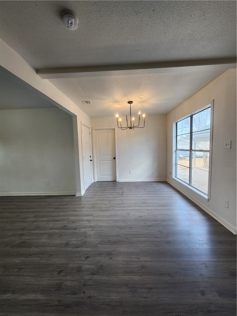 4818 Lansdown Drive Corpus Christi, TX 78411 - Photo 5 of 9 an empty room with wooden floor and windows