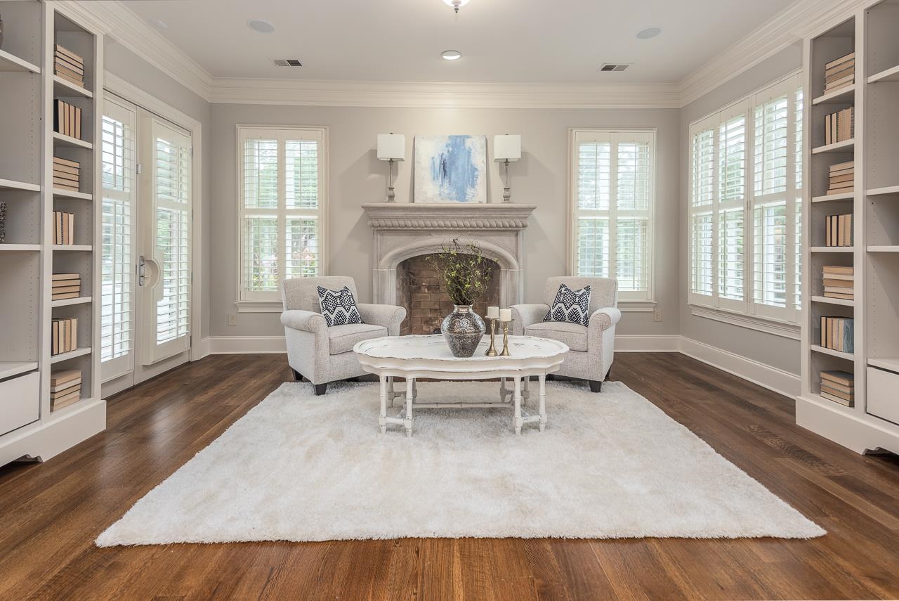 9844 Legends Drive Collierville, TN 38139 - Photo 12 of 25 a living room with furniture and a fireplace