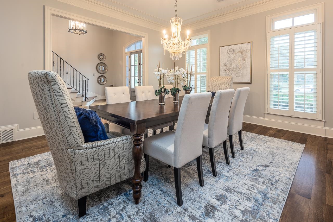 9844 Legends Drive Collierville, TN 38139 - Photo 6 of 25 a view of a dining room with furniture and a chandelier