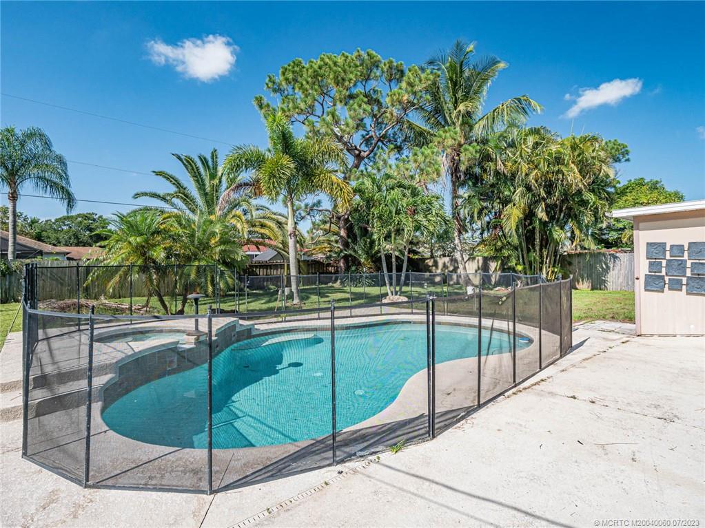 662 Southeast Ron Rico Terrace Port St. Lucie, FL 34983 - Photo 19 of 27 a view of a backyard