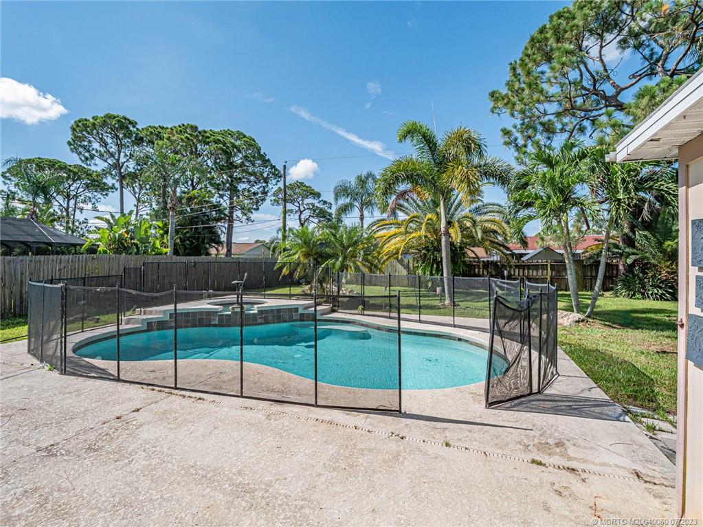 662 Southeast Ron Rico Terrace Port St. Lucie, FL 34983 - Photo 20 of 27 a view of a backyard