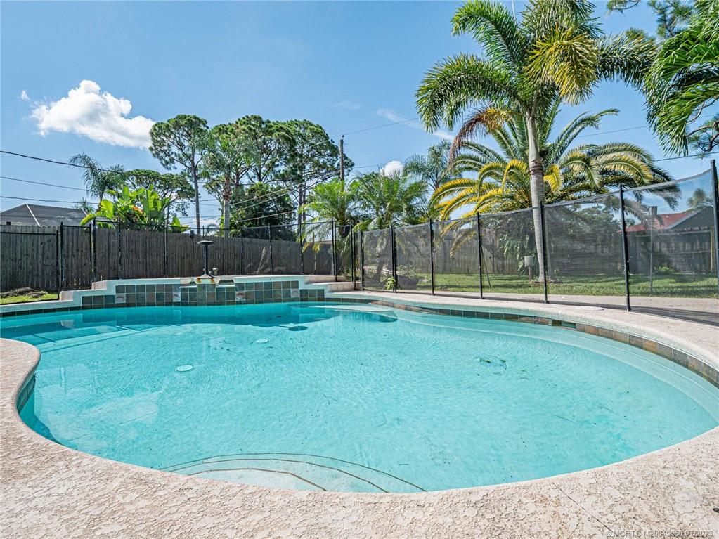 662 Southeast Ron Rico Terrace Port St. Lucie, FL 34983 - Photo 2 of 27 a view of a backyard