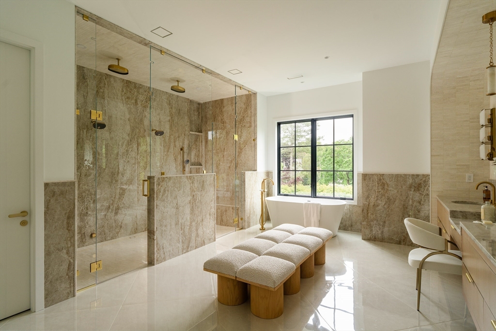 19 Bonnybrook Road Newton, MA 02468 - Photo 25 of 42 a spacious bathroom with a tub shower and windows