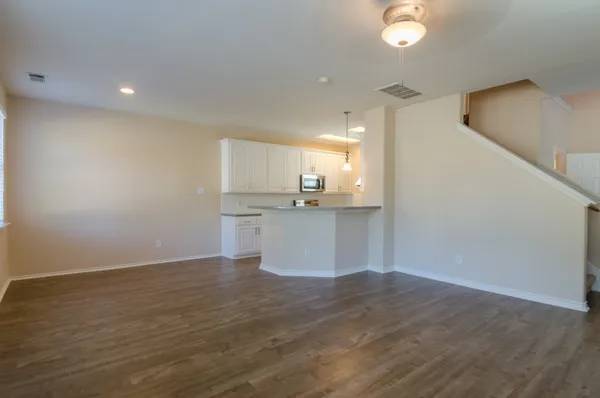 a view of a kitchen with a sink and dishwasher