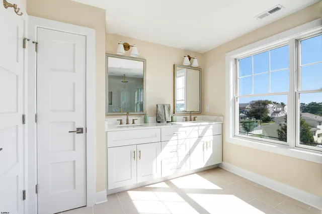 a bathroom with a shower and toilet