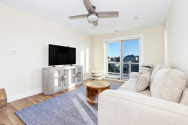 a kitchen with a white cabinets and a stove