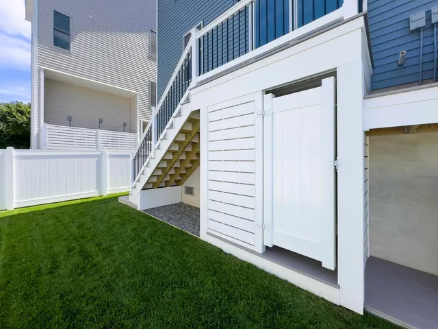 a view of a backyard of the house