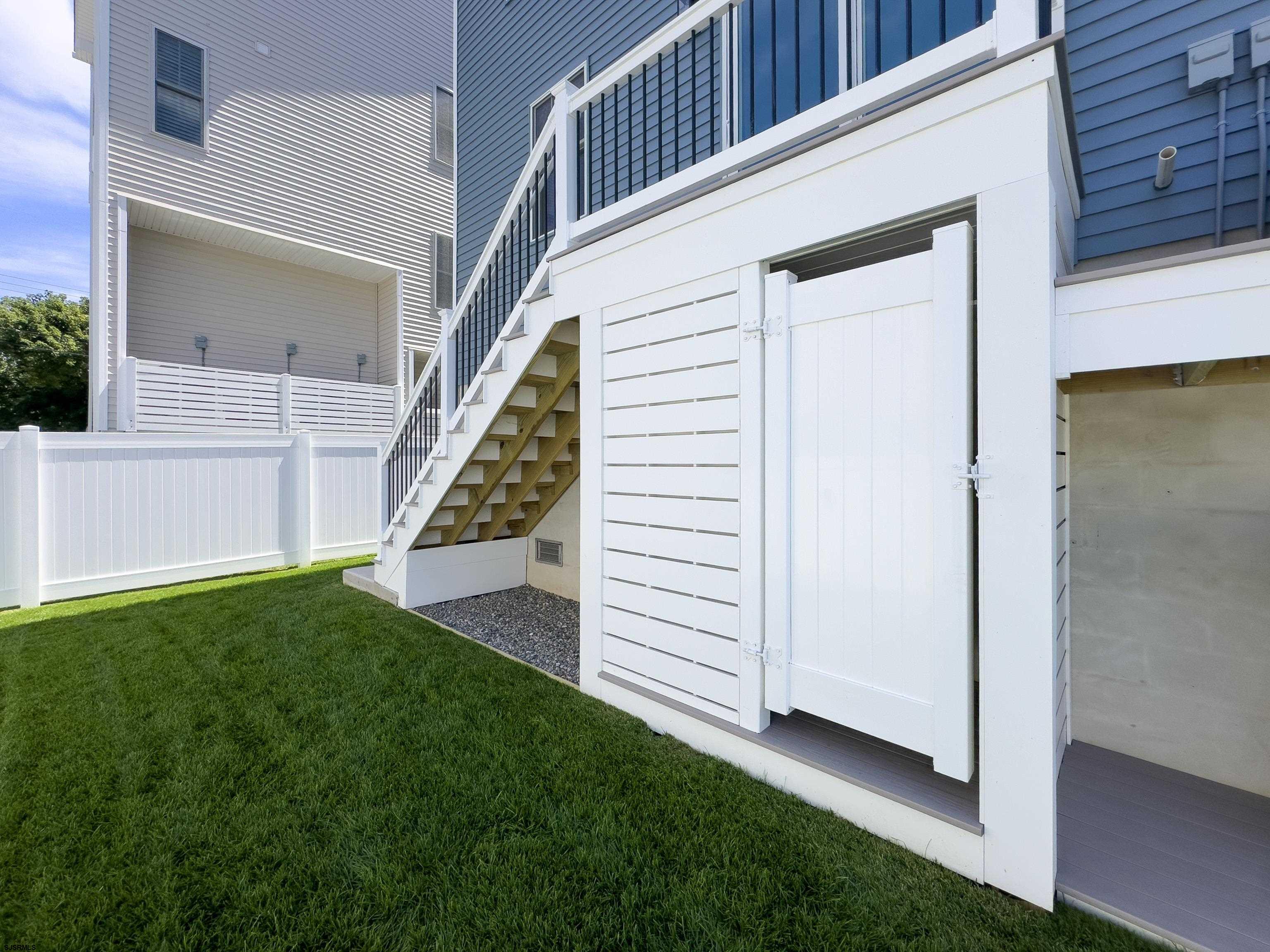 303 Lafayette Place Brigantine, NJ 08203 - Photo 36 of 38 a view of front door and yard