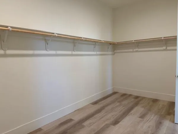 a view of a room with shelf on the wall