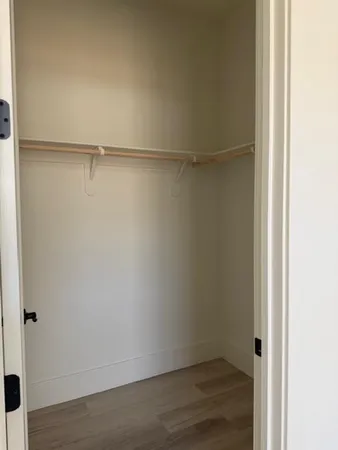 a empty closet with white paint
