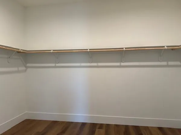 a view of an empty walk in closet