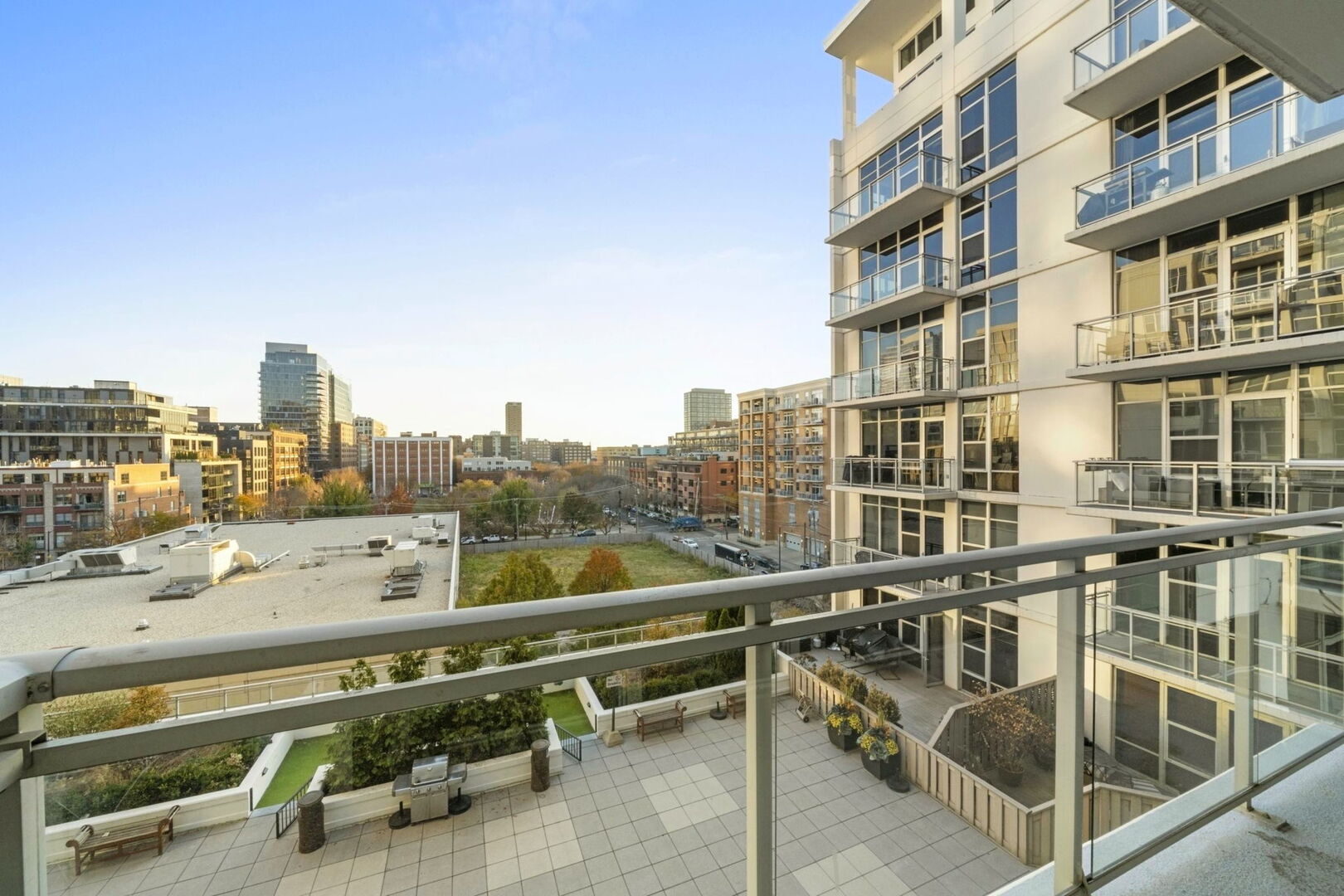 901 West Madison Street, Unit 603 Chicago, IL 60607 - Photo 8 of 25 a view of a city from a balcony with a patio