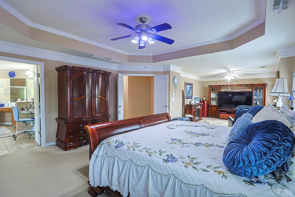 300 Hampton Place Canton, GA 30115 - Photo 55 of 82 a bed room with a bed and a television