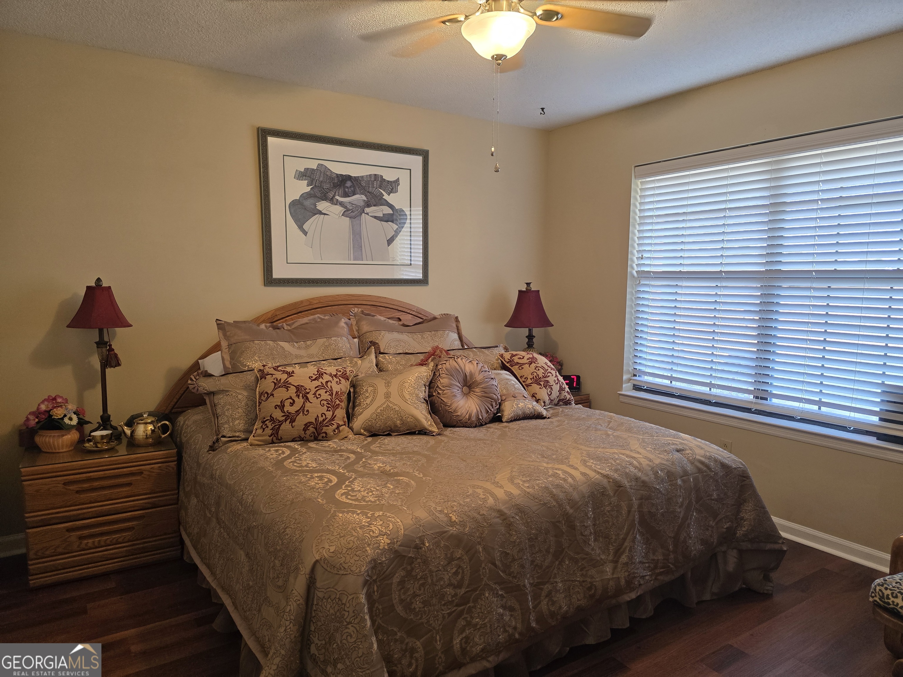 479 Mitchell Loop Bluffton, GA 39824 - Photo 27 of 51 a bed room with a bed and a painting on the wall