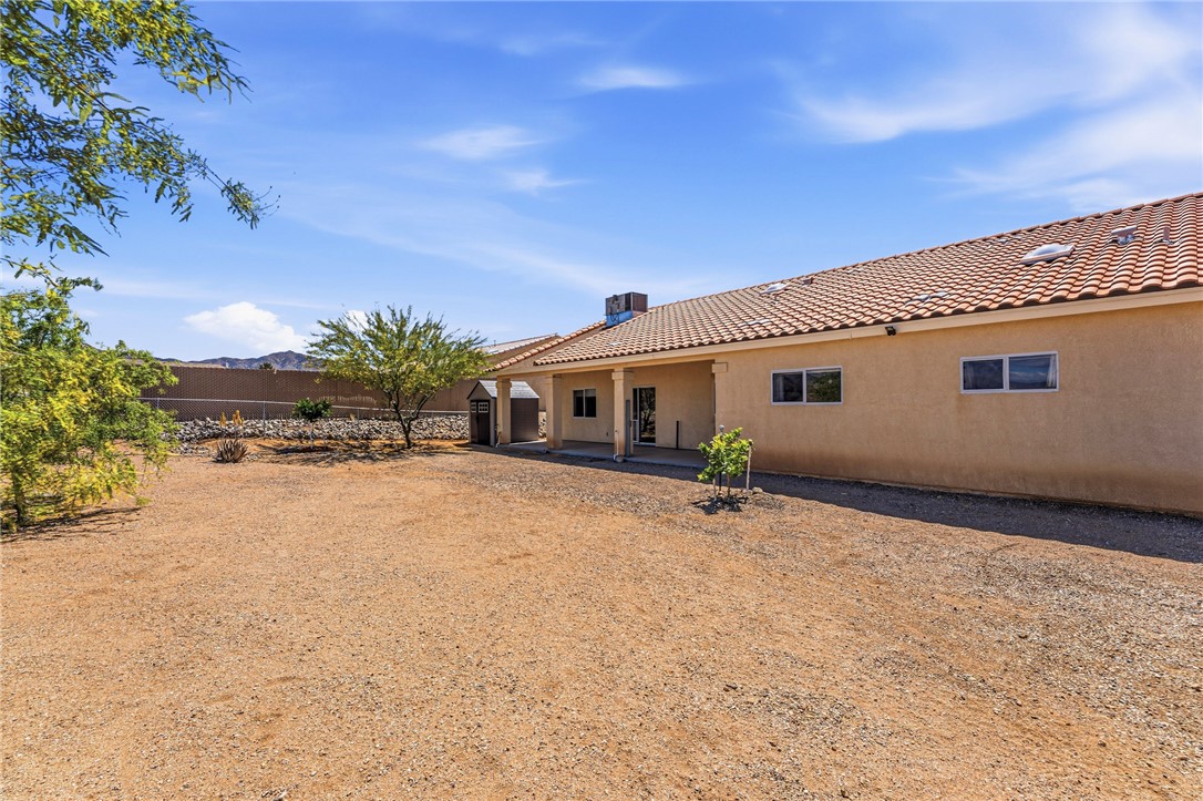 9332 Branded Road Kingman, AZ 86401 - Photo 36 of 44 a outdoor space with a house
