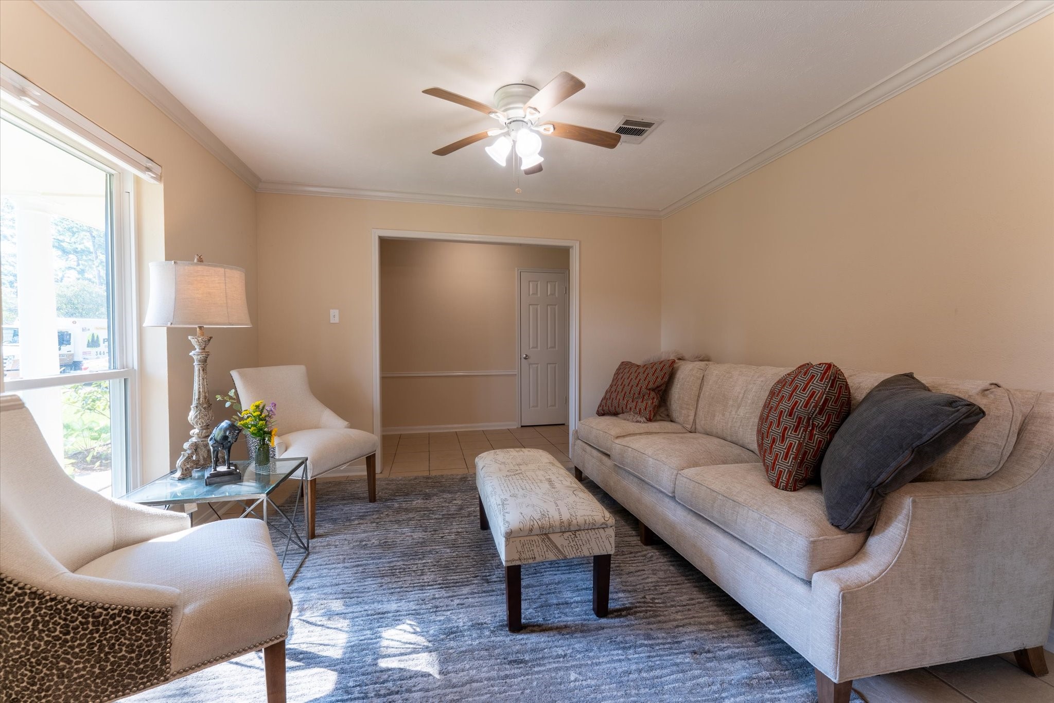25019 Barmby Drive Spring, TX 77389 - Photo 12 of 43 a living room with furniture and a large window