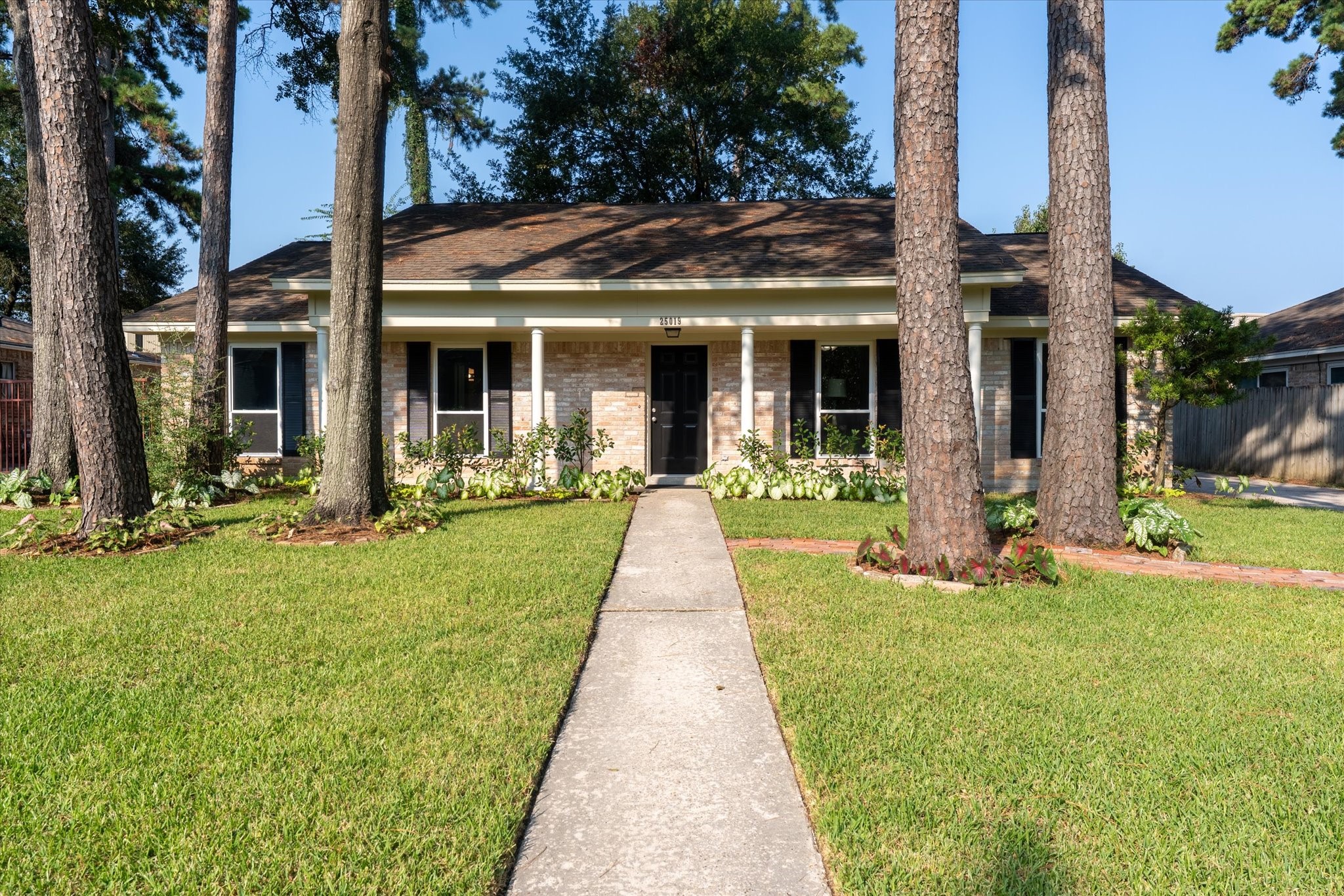 25019 Barmby Drive Spring, TX 77389 - Photo 2 of 43 a view of a house with entertaining space