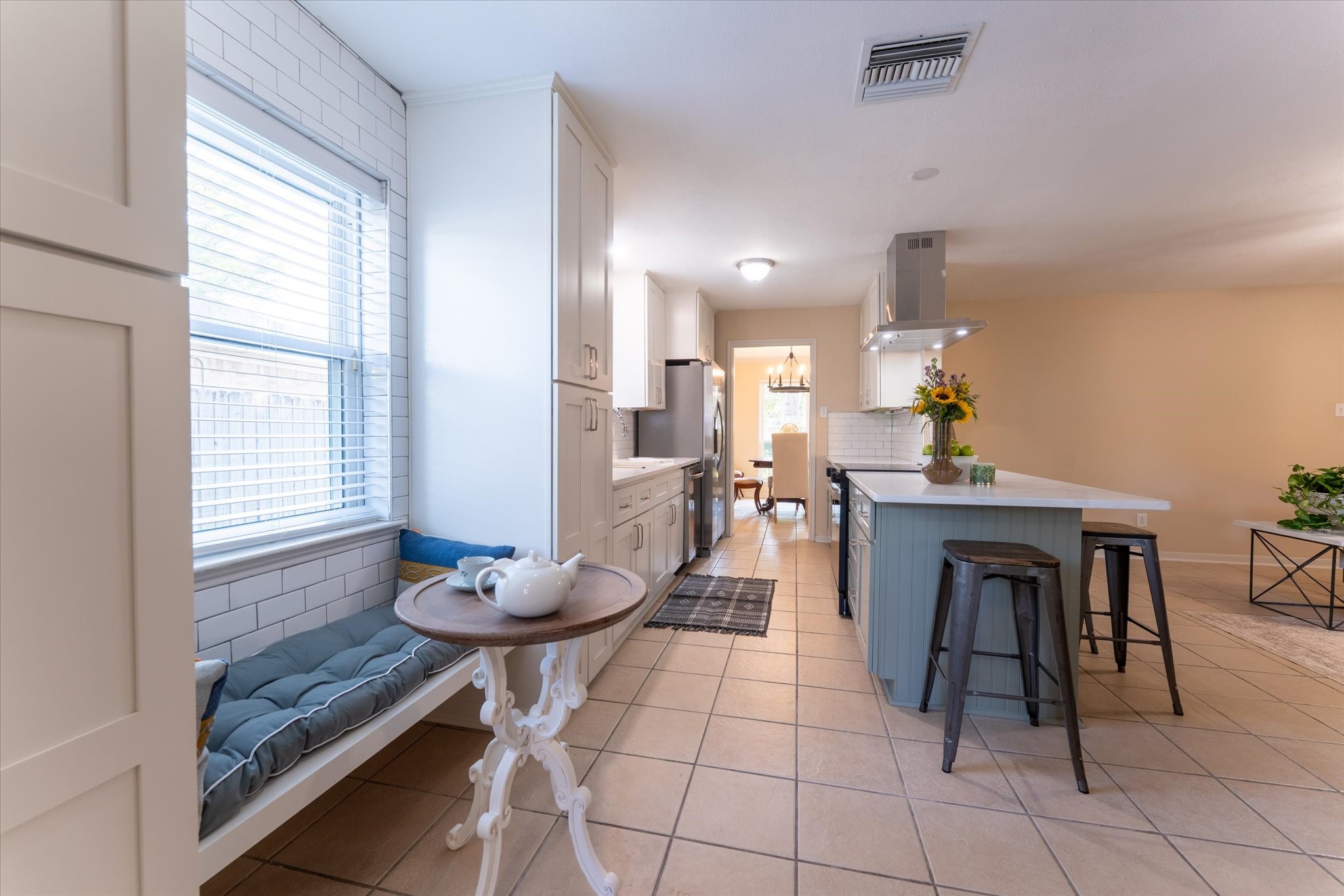 25019 Barmby Drive Spring, TX 77389 - Photo 23 of 43 a living room with furniture a dining table and a potted plant