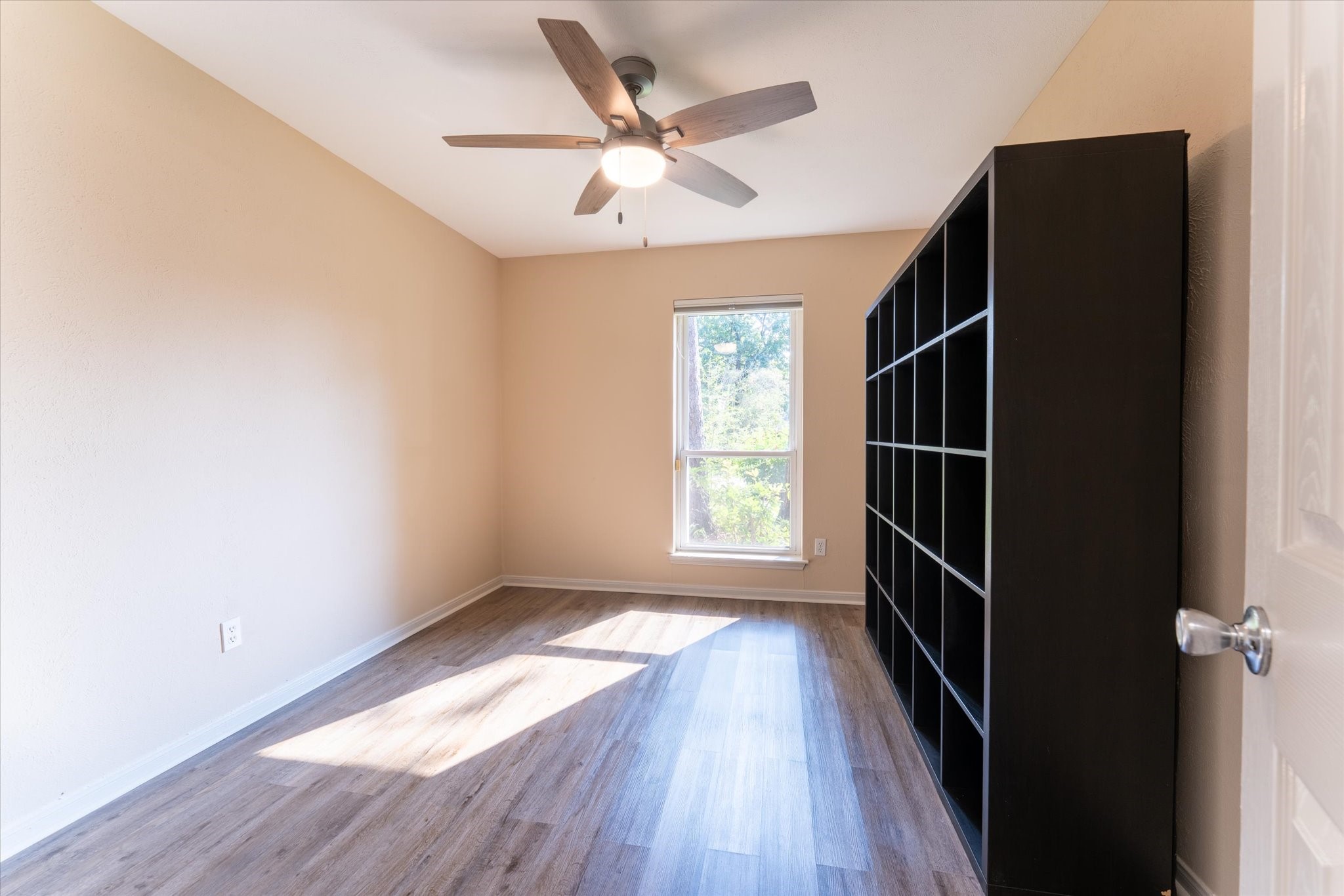 25019 Barmby Drive Spring, TX 77389 - Photo 31 of 43 wooden floor in an empty room with a window