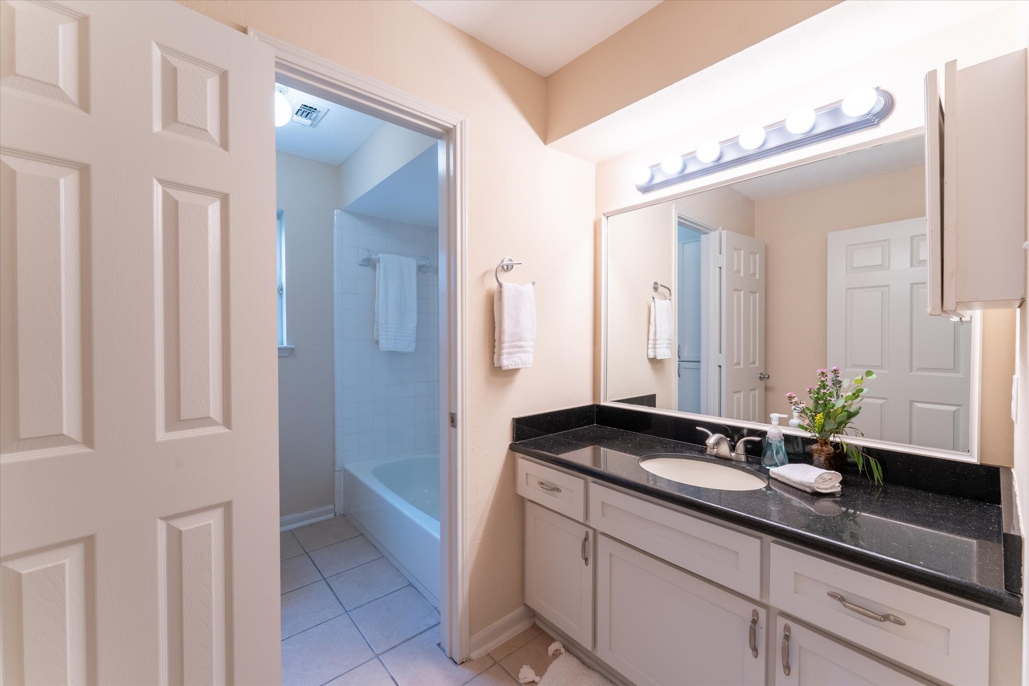 25019 Barmby Drive Spring, TX 77389 - Photo 32 of 43 a bathroom with a sink and a mirror