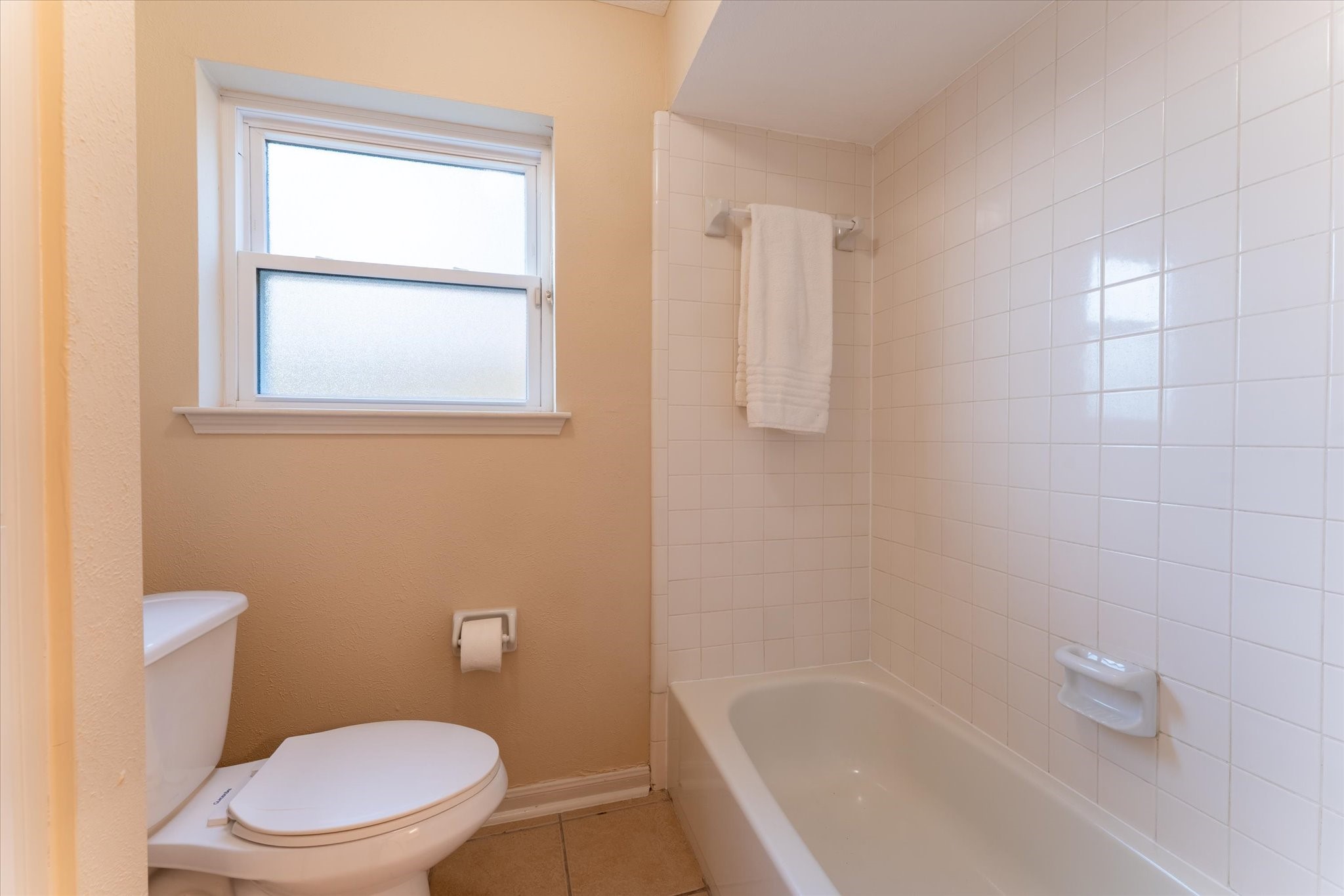 25019 Barmby Drive Spring, TX 77389 - Photo 35 of 43 a white toilet sitting next to a bath tub