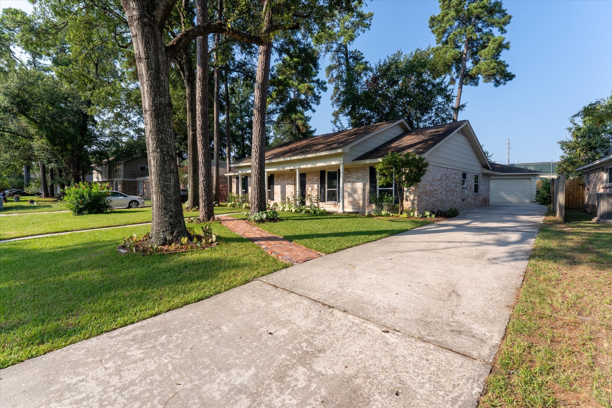 25019 Barmby Drive Spring, TX 77389 - Photo 4 of 43 a front view of a house with a yard