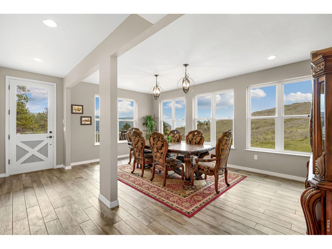 2051 Stove Prairie Road Bellvue, CO 80512 - Photo 10 of 50 Wall of windows with expansive views