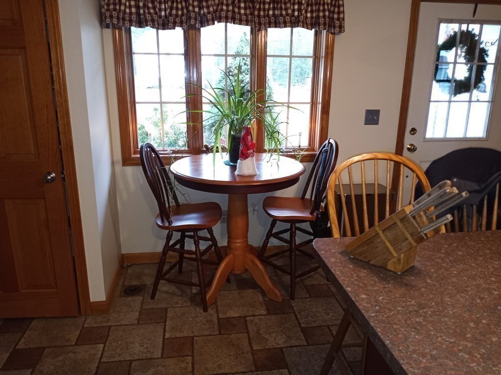 1753 White Pond Road Athol, MA 01331 - Photo 13 of 33 a view of a dining room with furniture window and outside view