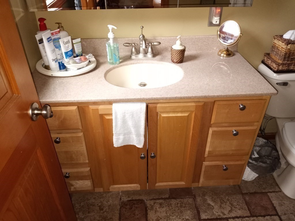 1753 White Pond Road Athol, MA 01331 - Photo 18 of 33 a bathroom with a granite countertop sink and a mirror