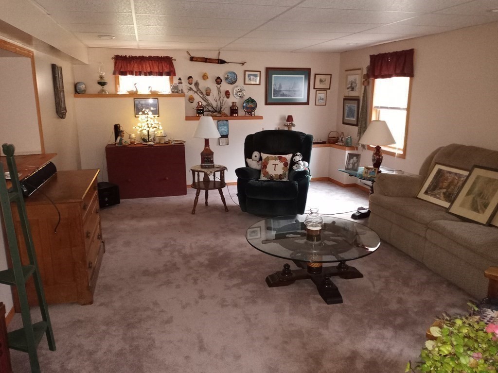 1753 White Pond Road Athol, MA 01331 - Photo 21 of 33 a living room with furniture and a flat screen tv