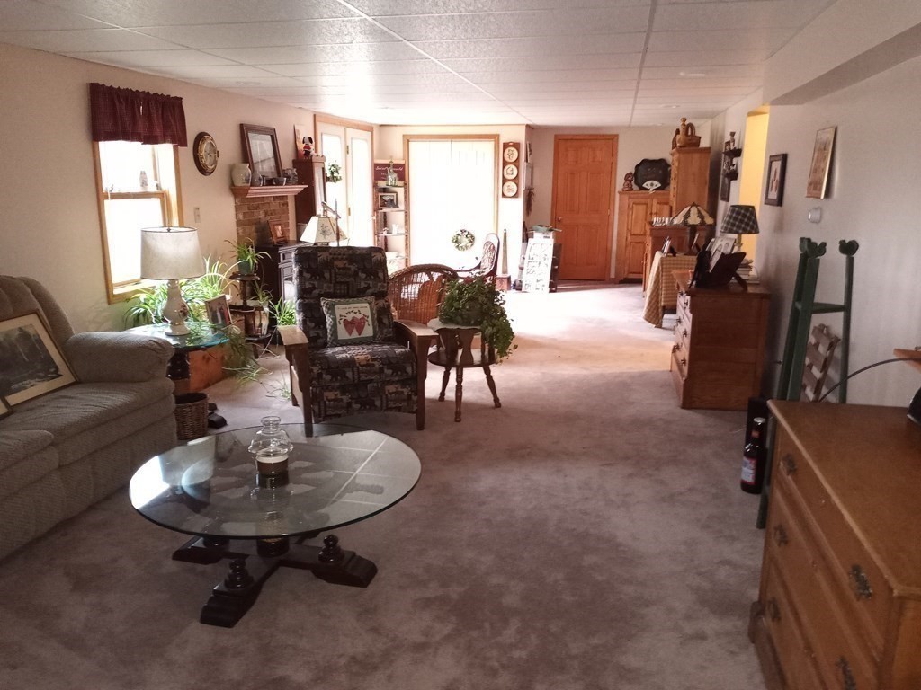 1753 White Pond Road Athol, MA 01331 - Photo 22 of 33 a living room with furniture and a table