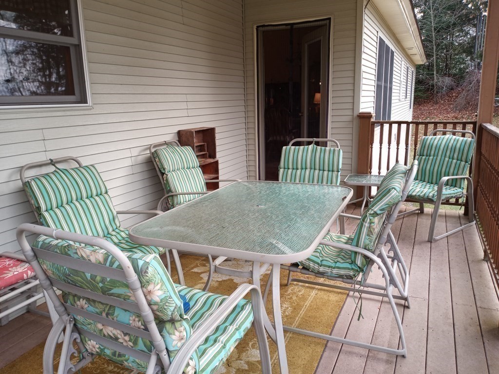 1753 White Pond Road Athol, MA 01331 - Photo 25 of 33 a view of a chairs and table in the patio