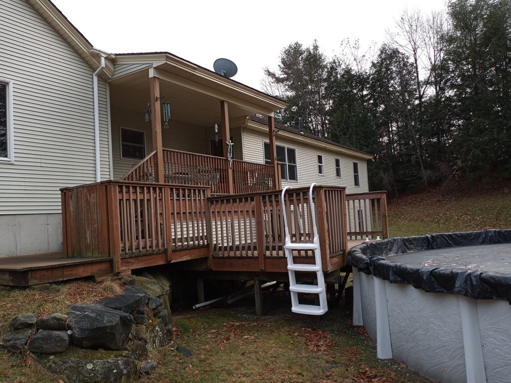 1753 White Pond Road Athol, MA 01331 - Photo 26 of 33 a view of a house with a yard and wooden fence