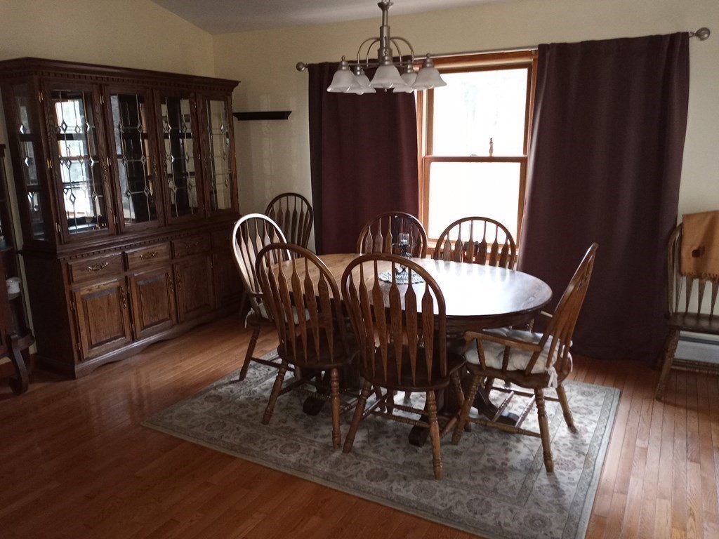 1753 White Pond Road Athol, MA 01331 - Photo 5 of 33 a view of a dining room with furniture window and wooden floor