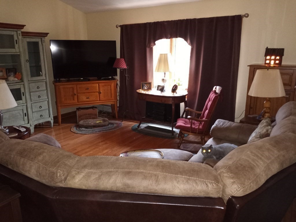 1753 White Pond Road Athol, MA 01331 - Photo 8 of 33 a room with furniture and a flat screen tv