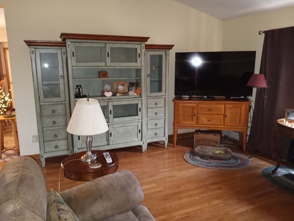 1753 White Pond Road Athol, MA 01331 - Photo 9 of 33 a living room with furniture and a flat screen tv